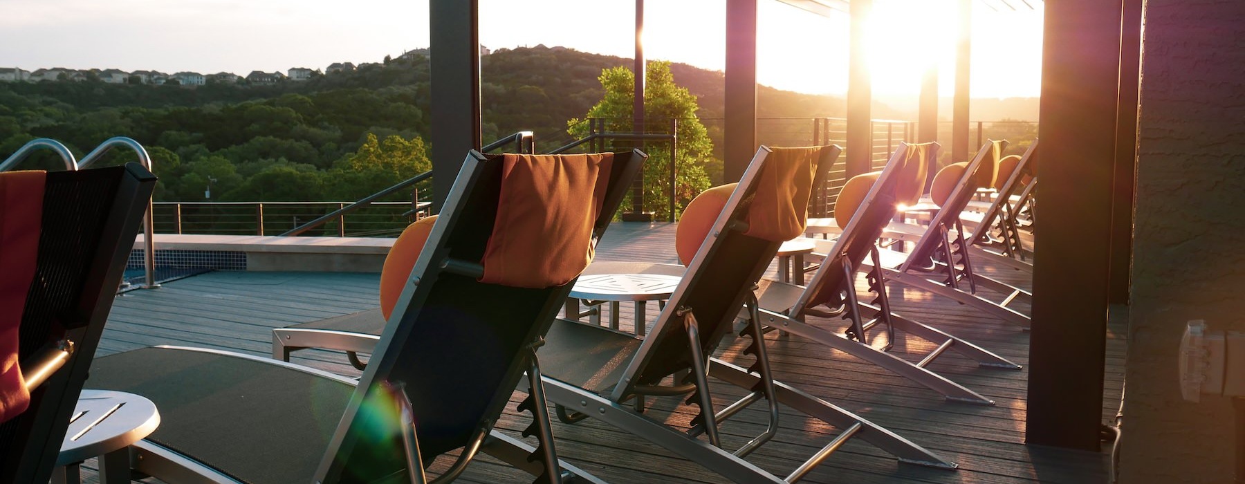 a group of chairs on a deck