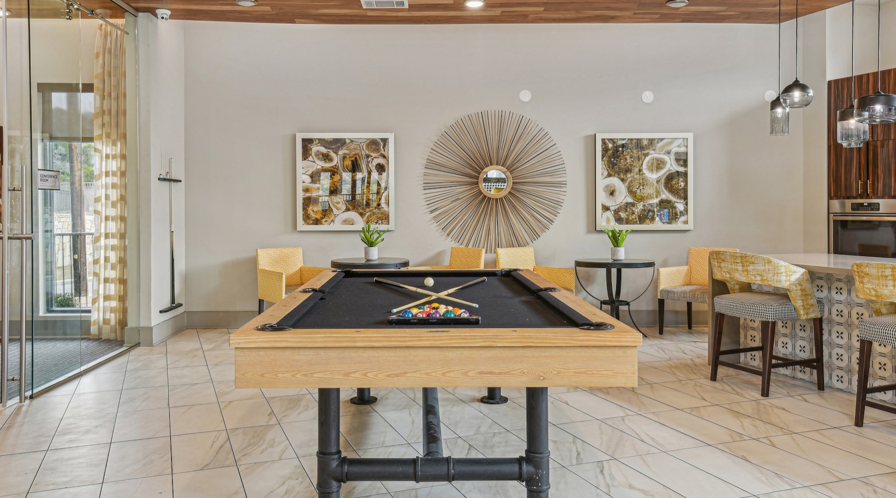 a clubroom with a pool table
